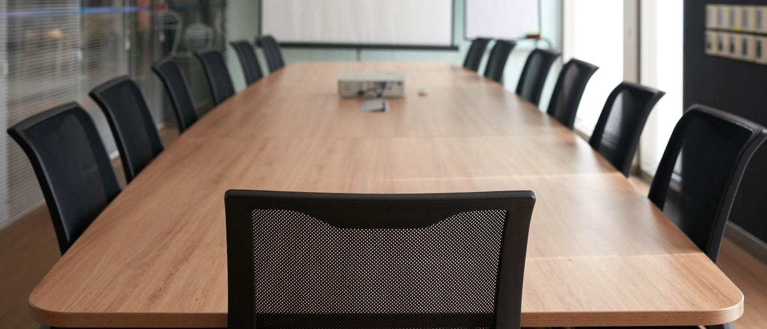 Empty boardroom awaiting applications